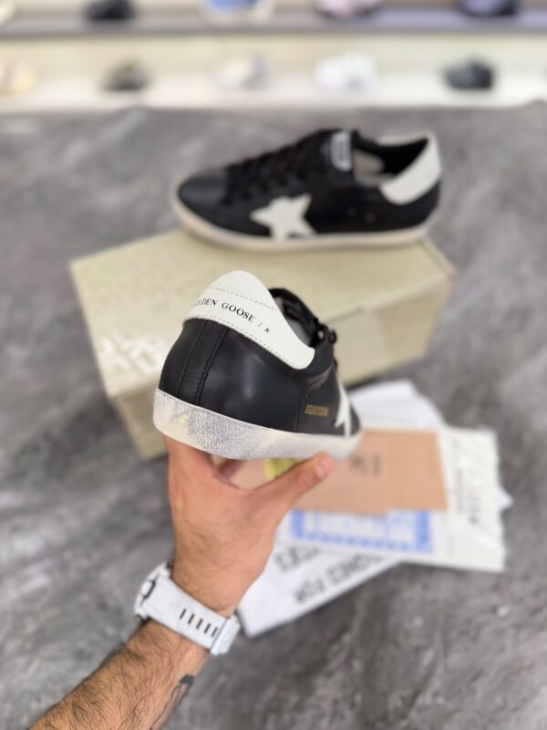 کتونی گلدن گوس سوپر استار مشکی با ستاره و پاشنه سفید (Golden Goose Super-Star Black Leather Sneakers with White Star & Heel) - Image 2