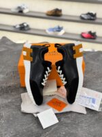 کتانی مردانه هرمس باونسینگ چرم و جیر مشکی سفید نارنجی (Hermès Bouncing Sneaker Black/Orang/White Suede & Leather) - Image 3
