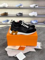 کتانی مردانه هرمس باونسینگ چرم و جیر مشکی سفید نارنجی (Hermès Bouncing Sneaker Black/Orang/White Suede & Leather) - Image 4