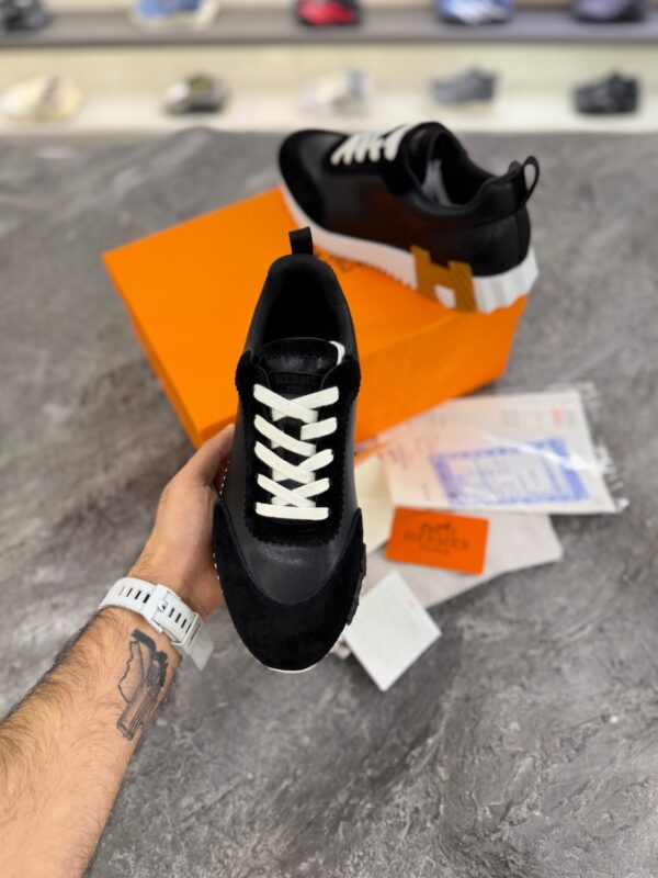 کتانی مردانه هرمس باونسینگ چرم و جیر مشکی سفید نارنجی (Hermès Bouncing Sneaker Black/Orang/White Suede & Leather) - Image 2