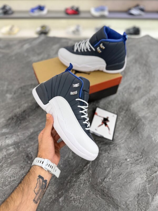 کتونی ایرجردن 12 سفید سورمه ای (Air Jordan 12 White/Navy) کتونی ایرجردن 12 سفید سورمه ای (Air Jordan 12 White/Navy)